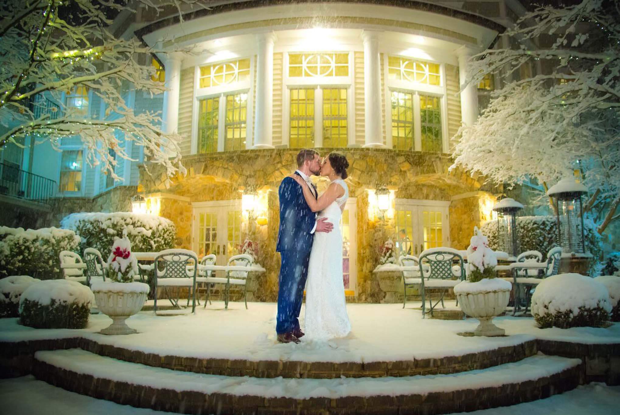 Bride and Groom Courtyard as Snow Falls