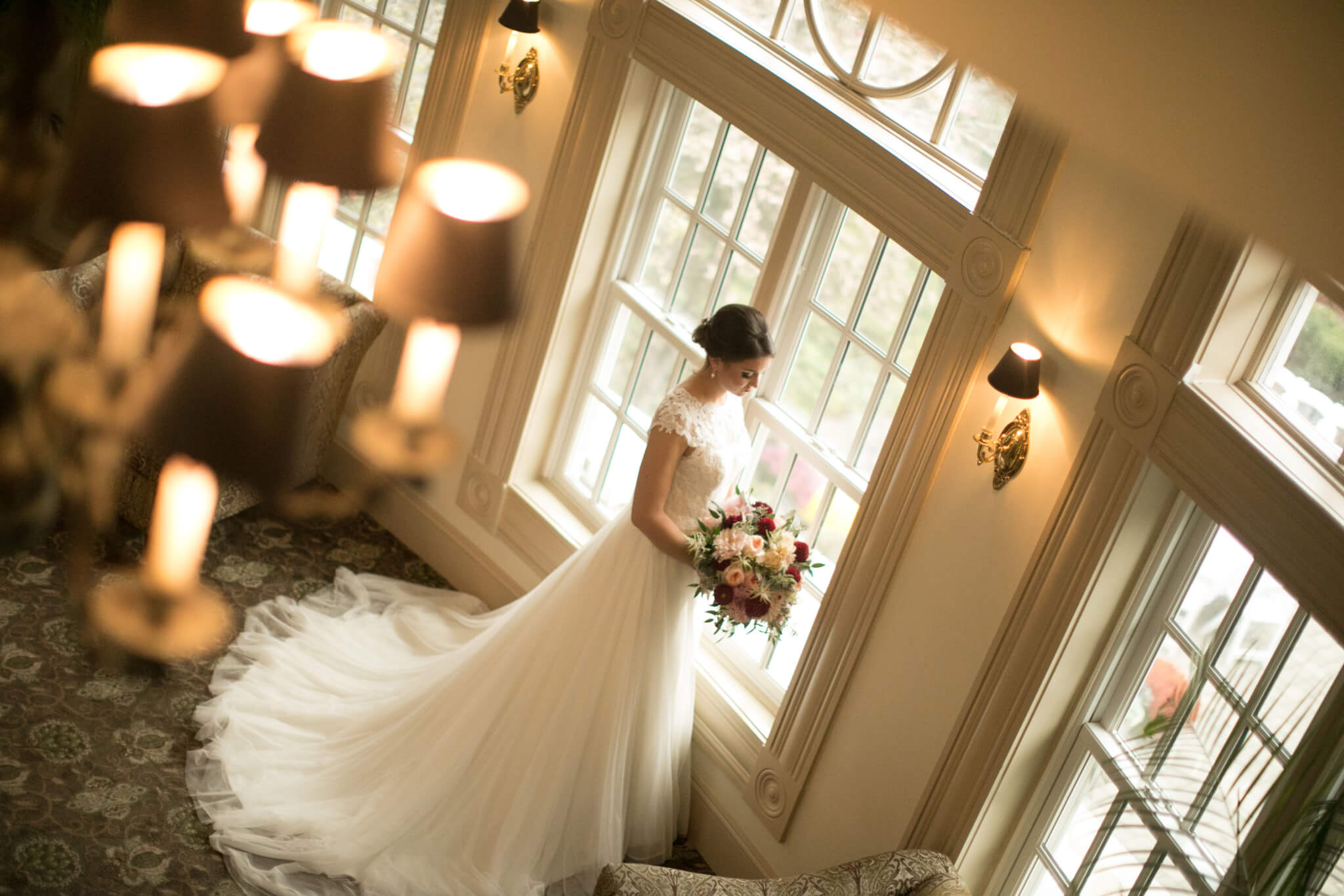 Bride in front of windows Piano Lounge